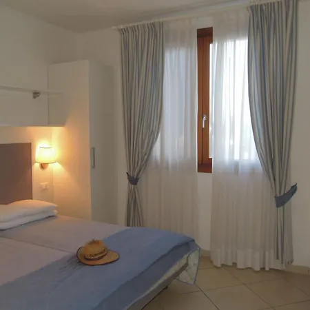 Апартаменты Spacious With Terraces And Fireplace Бибионе