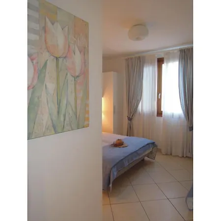 Апартаменты Spacious With Terraces And Fireplace Бибионе